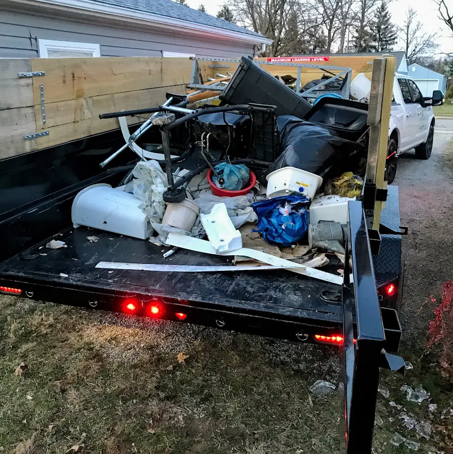 Roll-off dumpster delivered to a residential driveway in Framingham